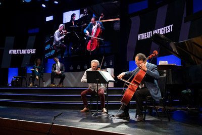 musicians playing on a large stage