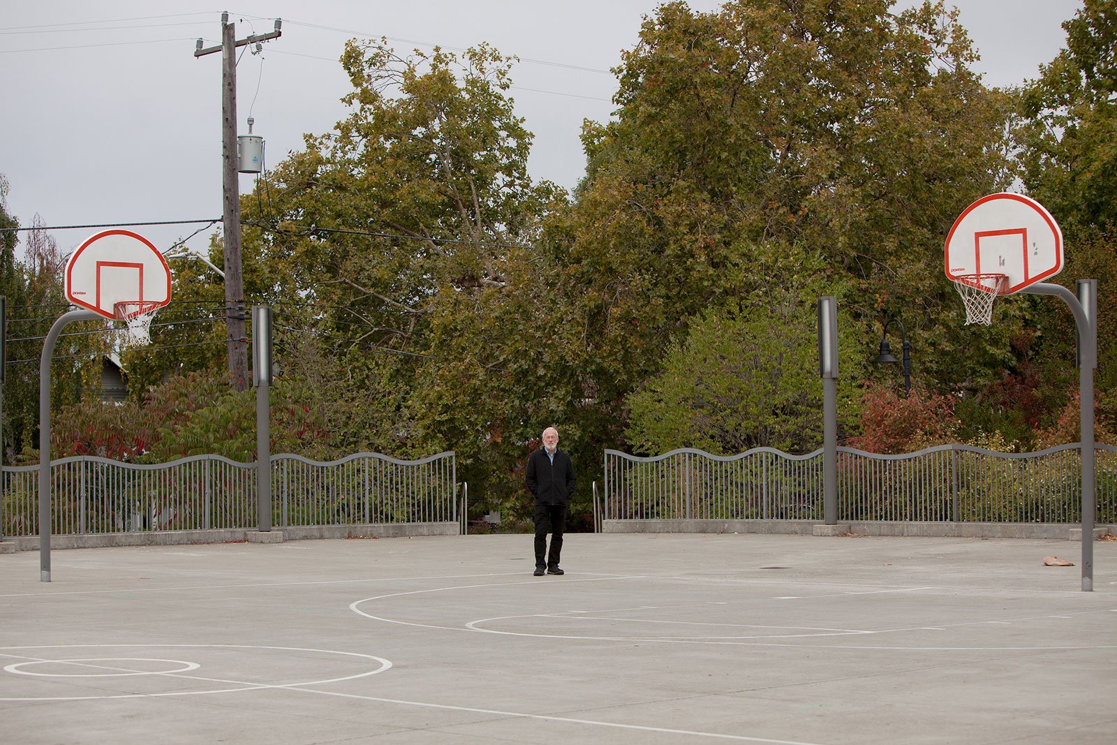 Leo Muller, executive director of CHOICES Education Group, on a basketball court