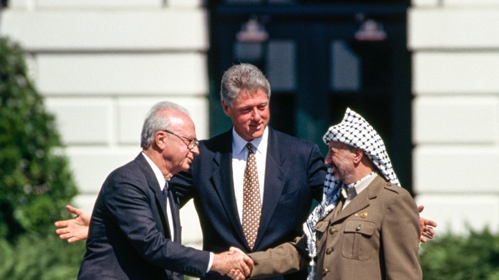 Bill Clinton with Yitzhak Rabin and Yasser Arafat at the White House in 1993.