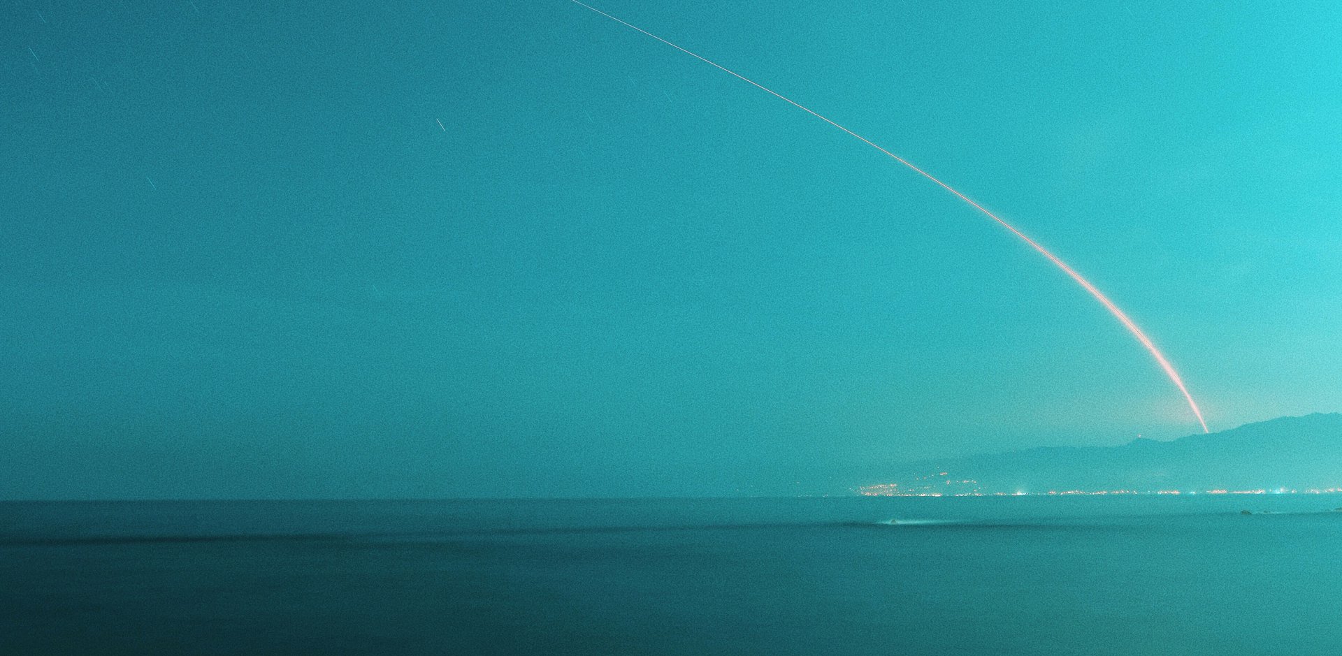 An Atlas V carrying NASA's InSight lander from Earth to Mars launches from Vandenberg Air Force Base on May 5, 2018, as seen from Santa Monica Pier.