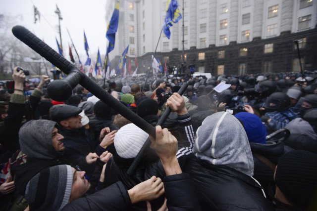 Opposition protesters clash with police in front of the Ukrainian Cabinet of Ministers in Kiev on Nov. 25.