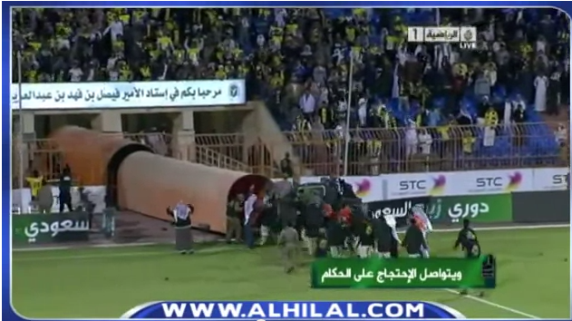 Saudi soccer fans booing and pelting a prince.