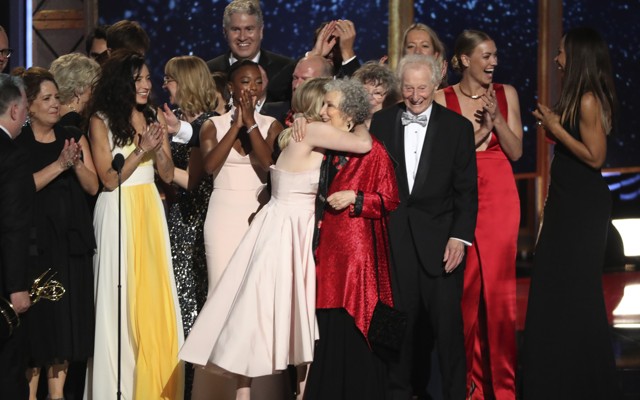 Elisabeth Moss and Margaret Atwood hug after 'The Handmaid's Tale' wins an Emmy for best drama series.