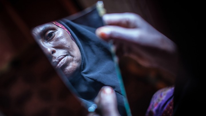 female circumcision is more complicated than you think the atlantic amran mahamood who has made a living for years by circumcising young girls looks into a piece of a mirror in hargeysa somalianichole sobecki getty