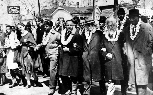 Martin Luther King Jr., Abraham Joshua Heschel, and others march in Selma, Alabama, in 1965.