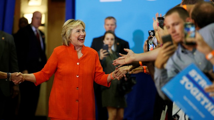 Clinton greets supporters at a rally.