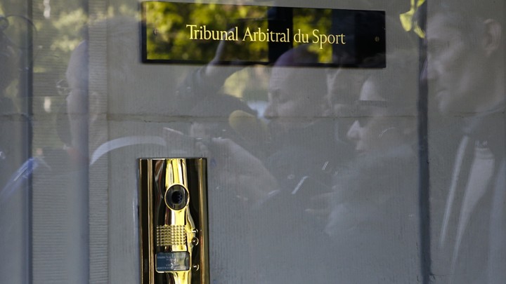 A door with a sign for the Court of Arbitration for Sport