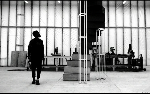 Frank Ocean looks up at his spiral staircase