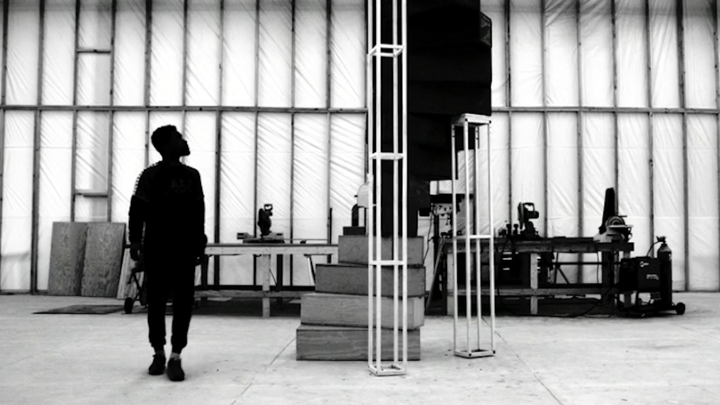 Frank Ocean looks up at his spiral staircase