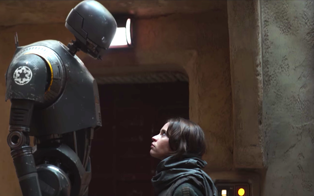 The droid K-2SO stares down Felicity Jones's character Jyn Erson in the 'Rogue One' trailer.