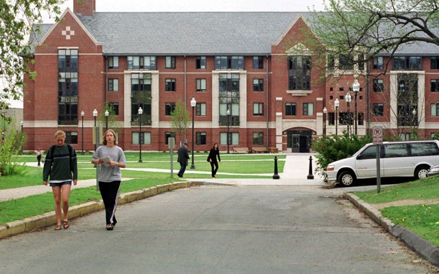 Students walk on the University of Connecticut campus where the creation of a black-male-only living space was recently announced.