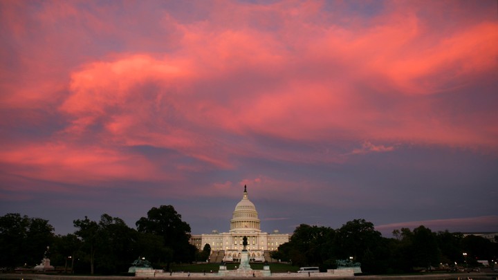 The sun sets over the U.S. Capitol Building