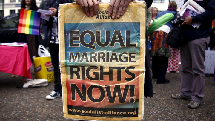 A placard supporting same-sex marriage is held at a rally in Sydney, Australia on May 31, 2015.