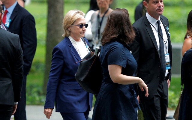 Hillary Clinton on the sidewalk outside her daughter's apartment Sunday