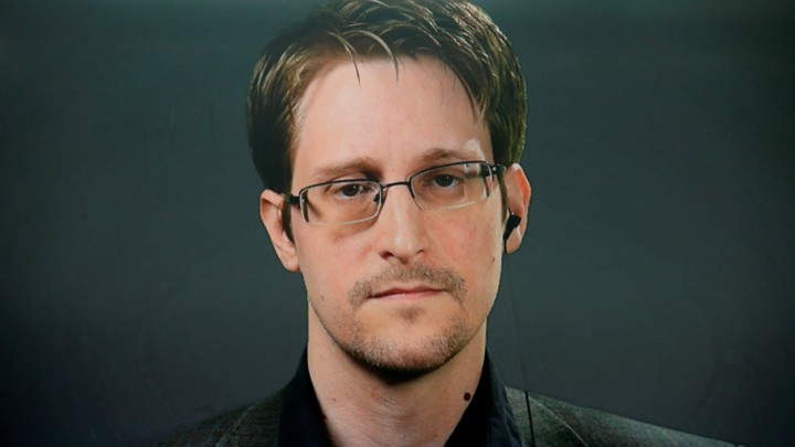 Edward Snowden speaks via video link during a news conference in New York City