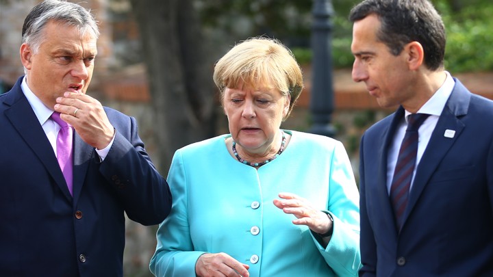 Hungarian Prime Minister Victor Orban (left) is seen with German Chancellor Angela Merkel and Austrian Chancellor Christian Kern at the EU meeting in Bratislava, Slovakia, on Friday.