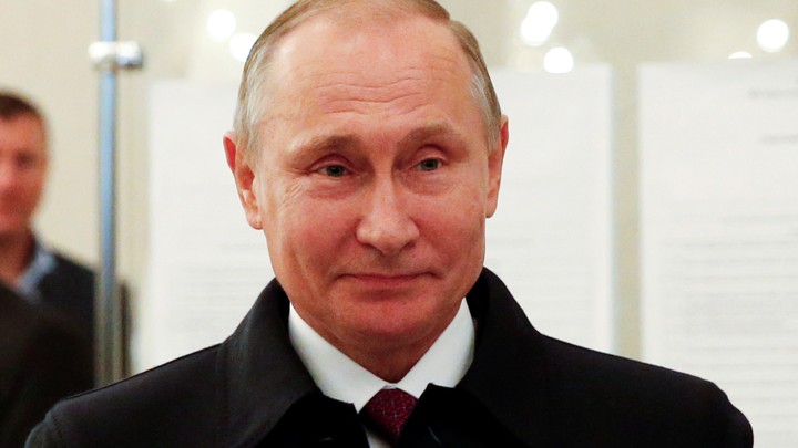 Russian President Putin visits polling station during parliamentary election in Moscow.