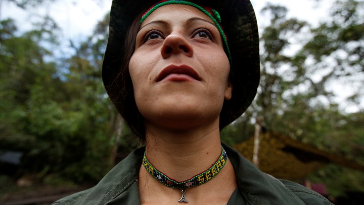 Alexandra, a member of the 51st Front of the Revolutionary Armed Forces of Colombia (FARC), poses for a picture at a camp in Cordillera Oriental, Colombia, August 16, 2016.