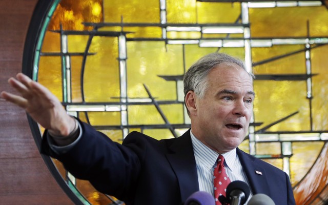 The Democratic vice-presidential candidate Tim Kaine stands, speaking, before a stained-glass window at a Unitarian Universalist Church in Virginia in July.