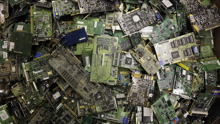 Electronic circuit boards are strewn about.