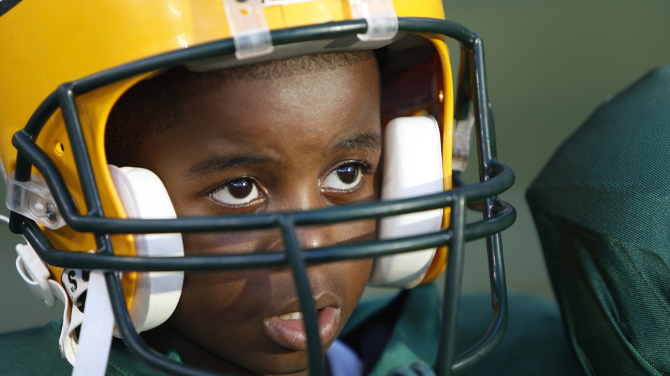 Convince Ms Candy Girl Porn - A player for the Pop Warner Packers game in Wisconsin Mike Roemer / AP