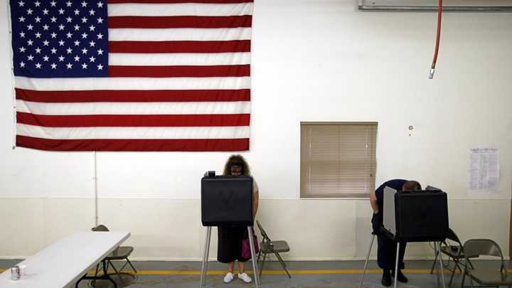 Residents vote early in their presidential primary at the Madison Township fire station in Hobbs, Indiana.