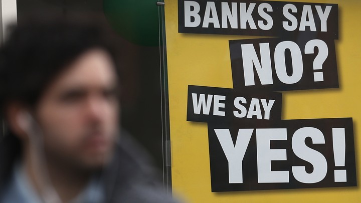 A sign advertising payday loans