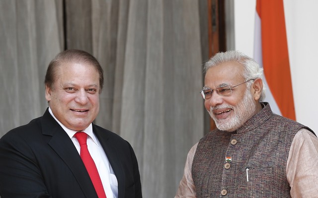 India Prime Minister Narendra Modi (R) and his Pakistani counterpart Nawaz Sharif smile before the start of their bilateral meeting in New Delhi May 27, 2014.