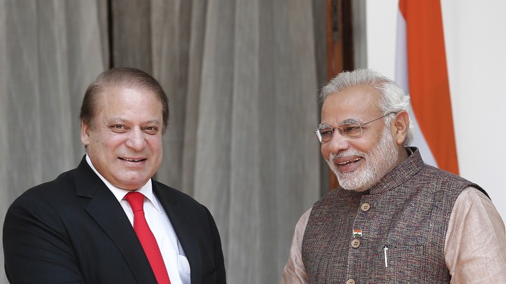 India Prime Minister Narendra Modi (R) and his Pakistani counterpart Nawaz Sharif smile before the start of their bilateral meeting in New Delhi May 27, 2014.