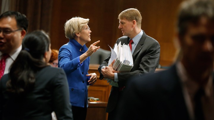 Senator Elizabeth Warren with the CFPB's director, Richard Cordray