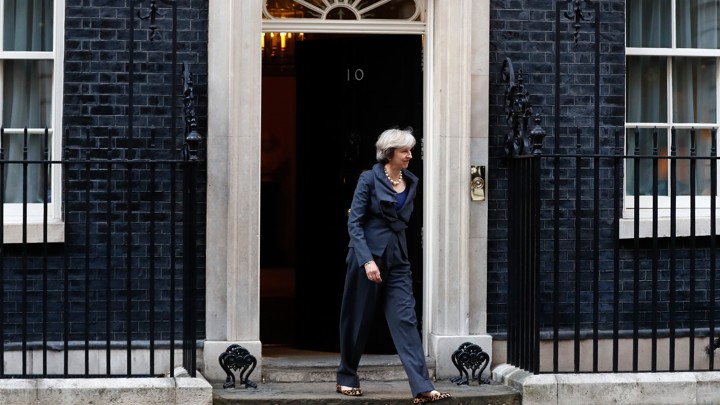 British Prime Minister Theresa May walks out of 10 Downing Street in London on September 22, 2016.