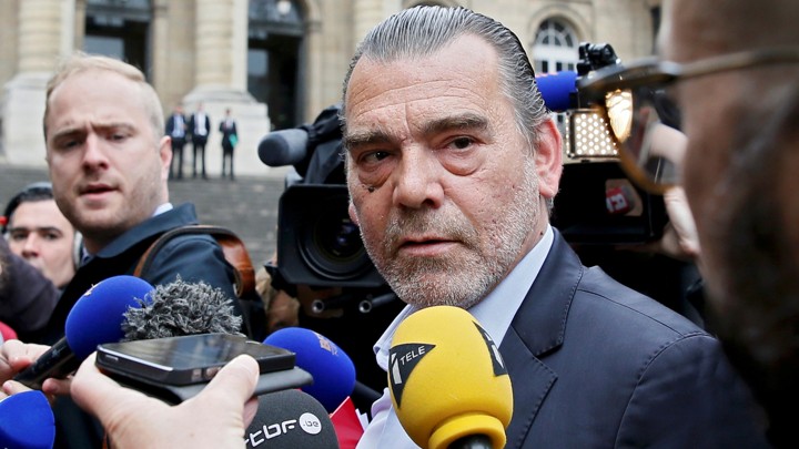 Journalists surround Frank Berton, lawyer of Salah Abdeslam, outside the courthouse after the arrival of the Paris attacks suspect at the main law court in Paris, France, May 20, 2016.
