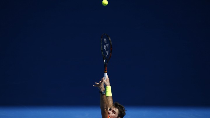 Stan Wawrinka delivering an overhead serve