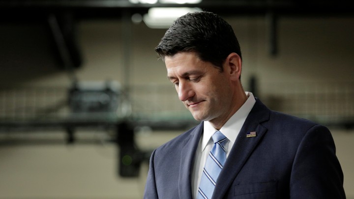 Paul Ryan stands on stage for a news conference in Washington, D.C.