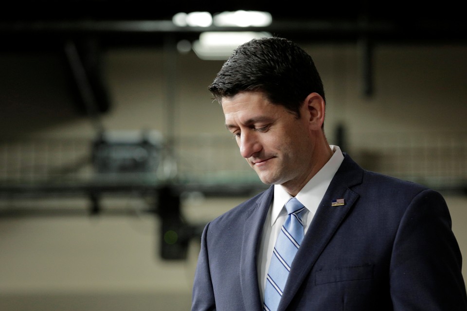 Paul Ryan stands on stage for a news conference in Washington, D.C.