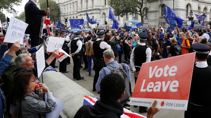 Supporters and opponents of Brexit demonstrate on the streets of London.