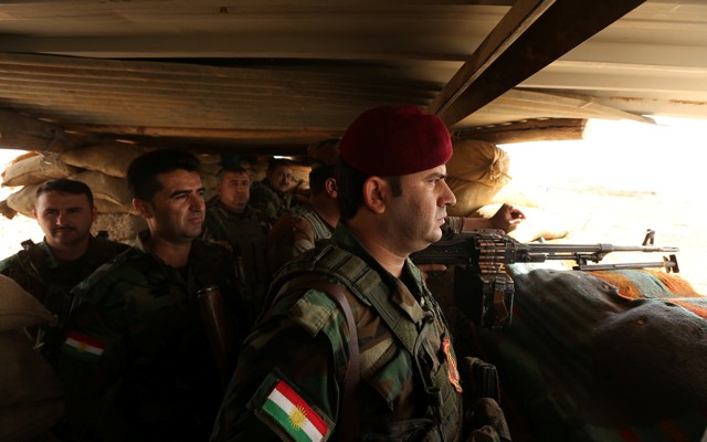 Peshmerga forces gather on the outskirt of Mosul during preparations to attack Mosul, Iraq