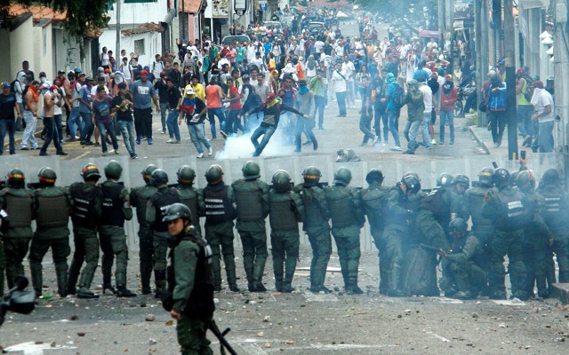 Demonstrators clash with members of Venezuelan National Guard