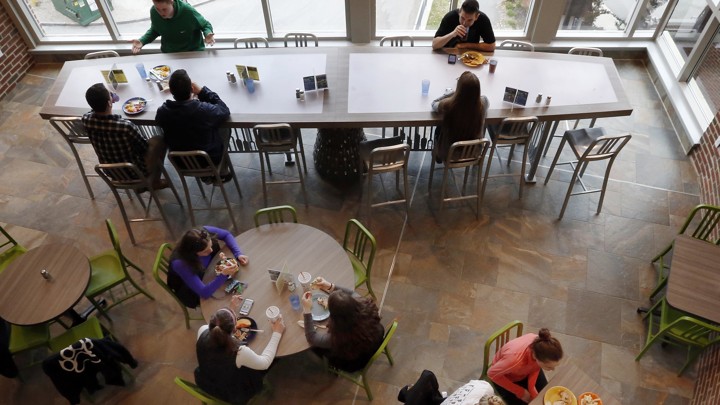 Students at the University of New Hampshire have lunch at a $17,000 custom-made, LED-light-equipped chef's table, which the university now acknowledges was an inappropriate purchase.