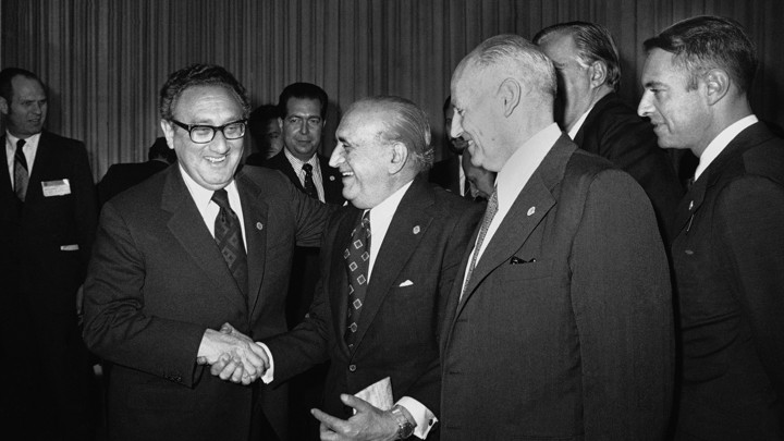 U.S. Secretary of State Henry Kissinger greets Argentina's Foreign Minister, Alberto J. Vignes, as Ismael Huerta Diaz, right, foreign ministers of Chile, looks on during break in Latin Foreign Ministers Conference in Mexico City, Feb. 22, 1974.