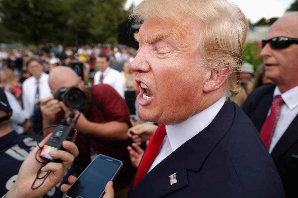 Donald Trump talks with journalists during a rally against the Iran nuclear deal
