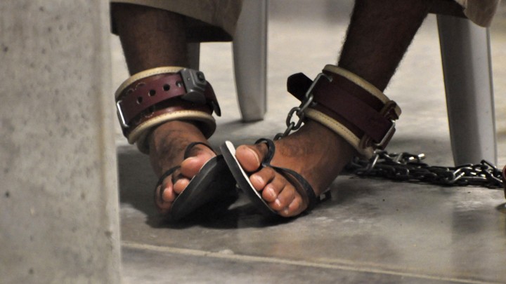 A detainee's feet are shackled to the floor as he attends a "Life Skills" class inside the Camp 6 high-security detention facility at Guantanamo Bay U.S. Naval Base in 2010.