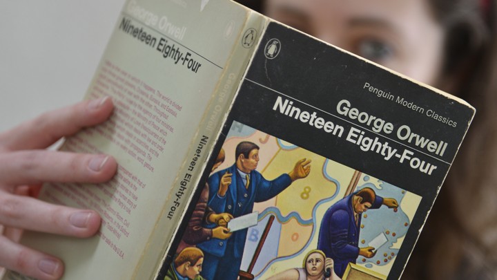 Top 8 Books to Gift to Teenagers Image result for person reading 1984 book pic