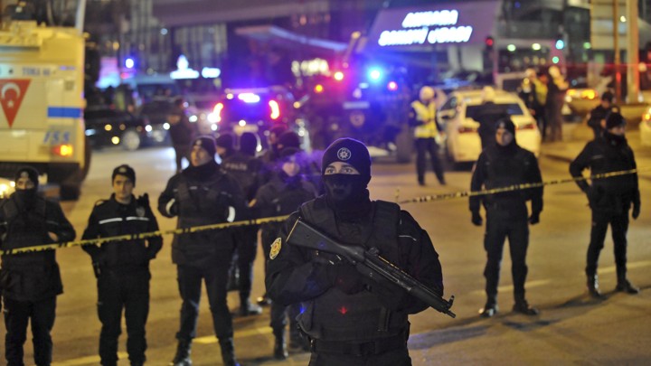 Turkish police officers cordon off the area around the gallery where Andrey Karlov was shot and killed by a gunman in Ankara on December 19, 2016.