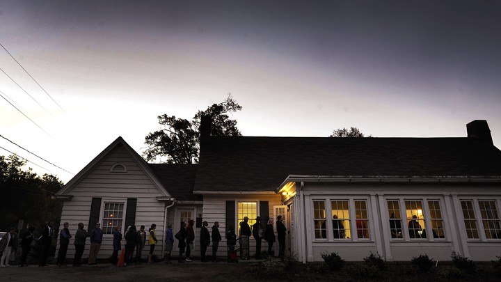 A line forms outside a voting precinct before it opens on November 8, 2016 in Durham, North Carolina.
