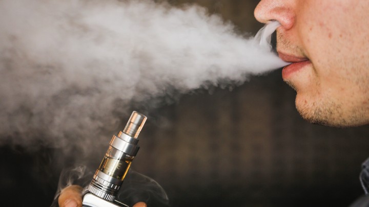 Man using an e-cigarette