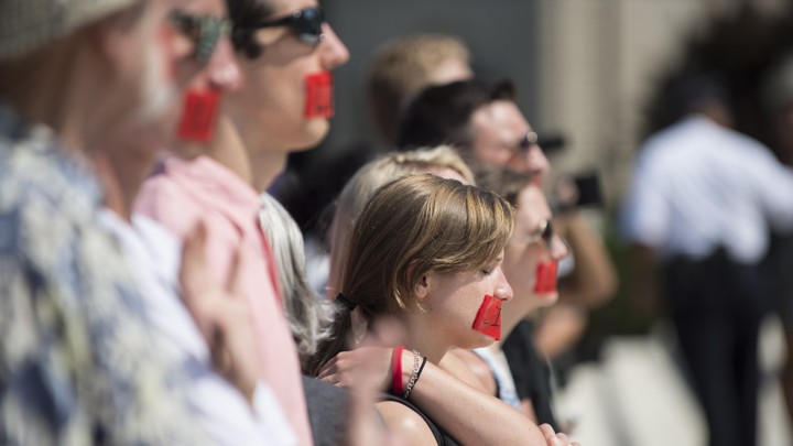 Pro-life activists pray on the steps of the United States Supreme Court on June 27, 2016.