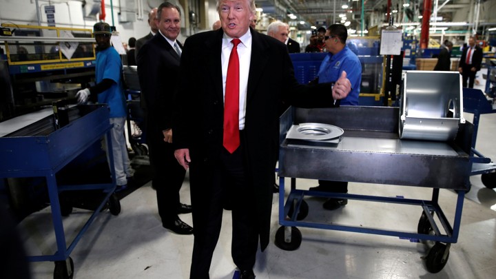 U.S. President-elect Donald Trump speaks to members of the news media as he tours a Carrier factory in Indianapolis, Indiana, on December 1, 2016.