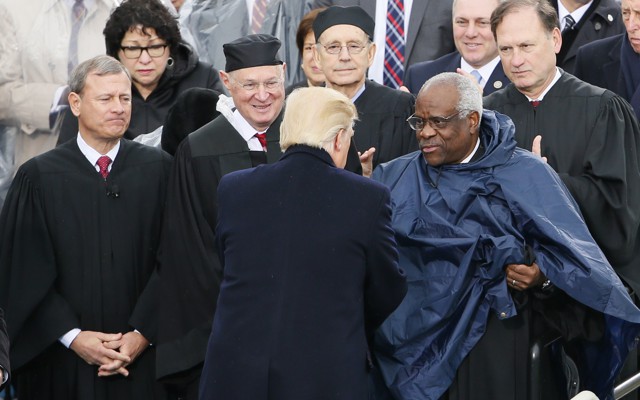 Donald Trump greets members of the Supreme Court at his inauguration.