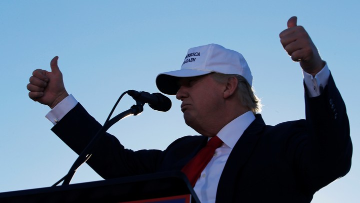 President-elect Donald Trump gives two thumbs up.